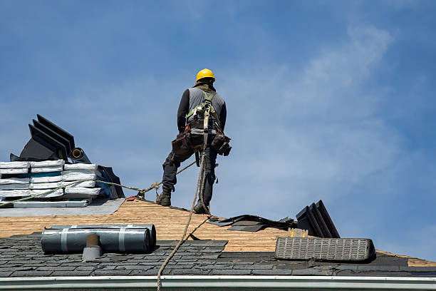 Professional Roof Replacement technician working in Central Falls, RI
